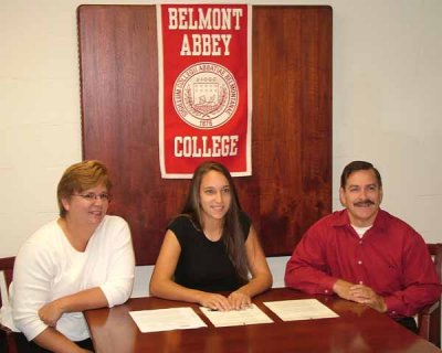 Mom & Dad & Kelsey At BAC signing.jpg